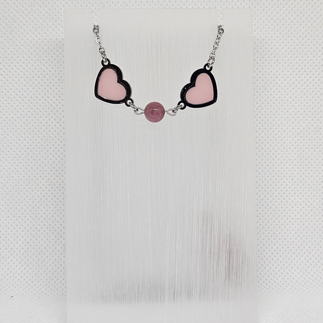 Pendentif en métal et résine