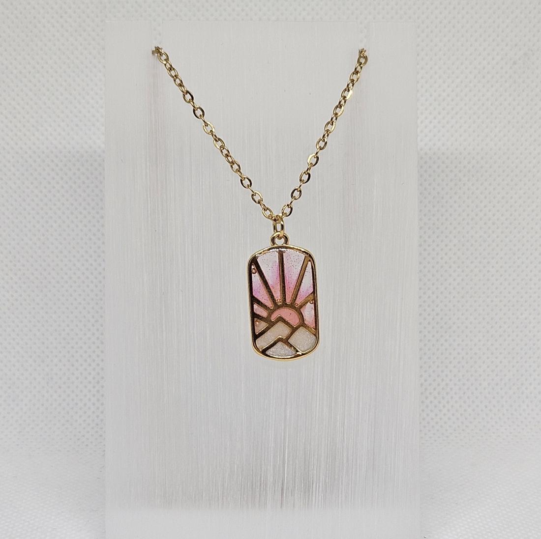 Pendentif en métal et résine