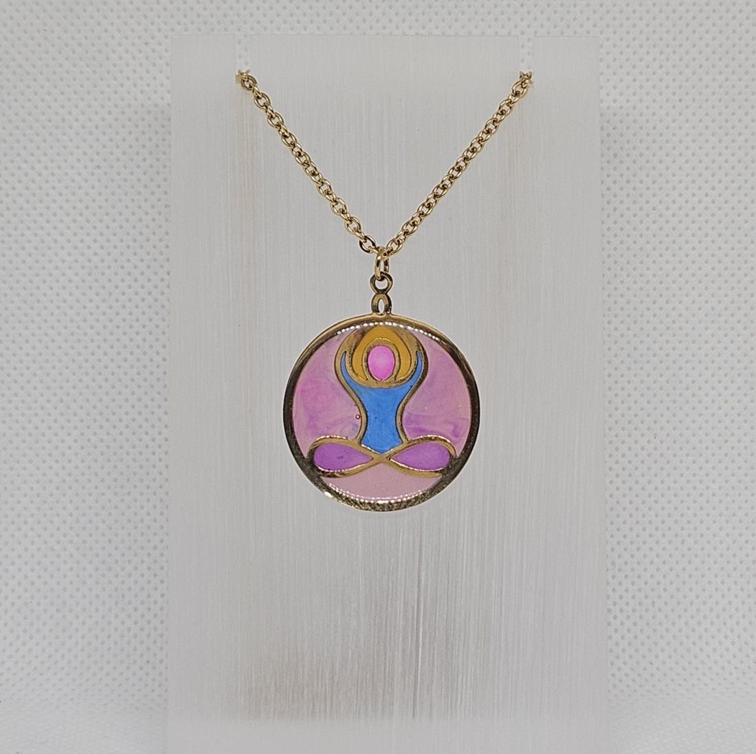 Pendentif en métal et résine